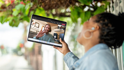 A student using Microsoft Teams to connect with a friend over a video call.